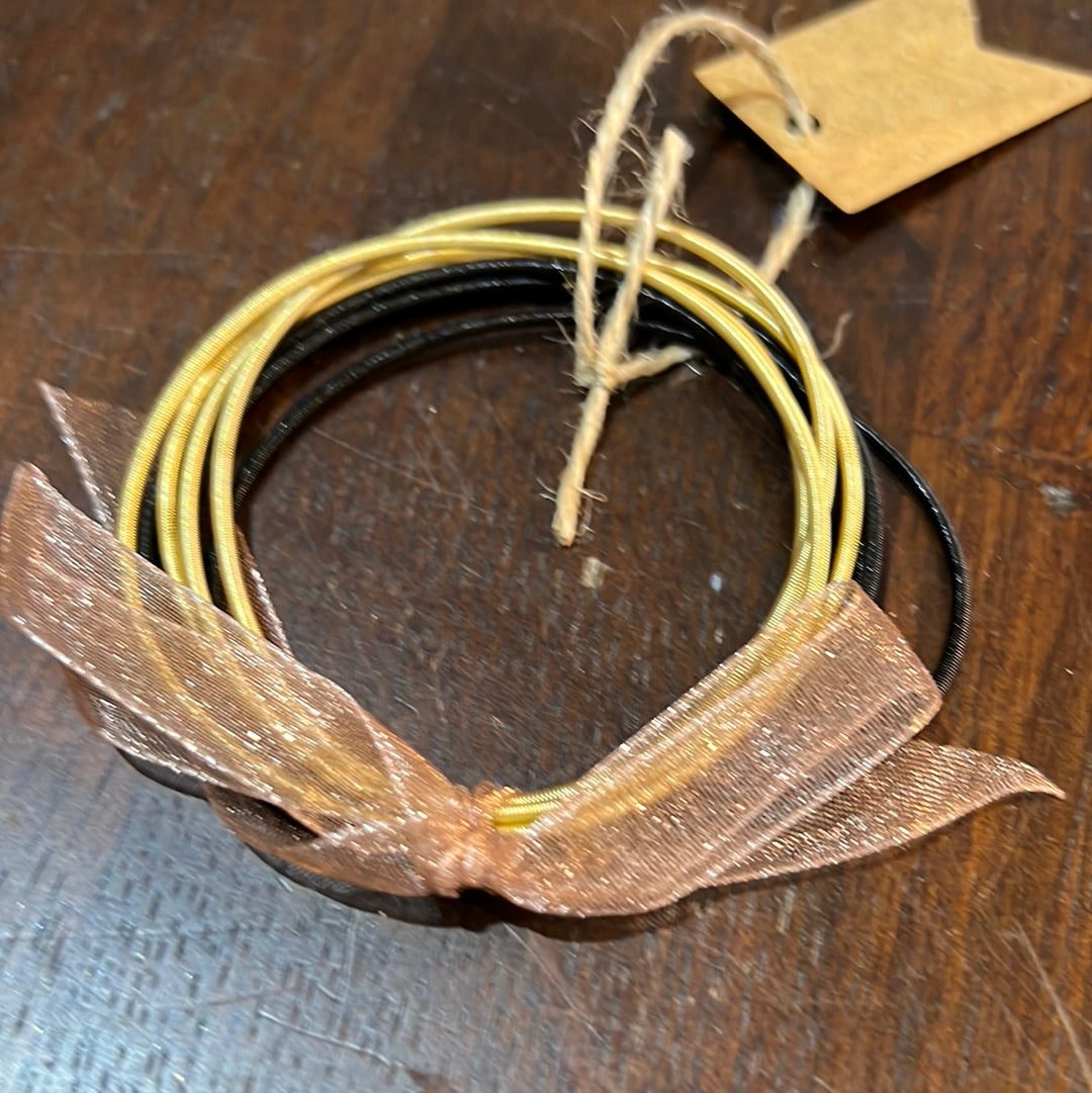 Yellow/black guitar string bracelet