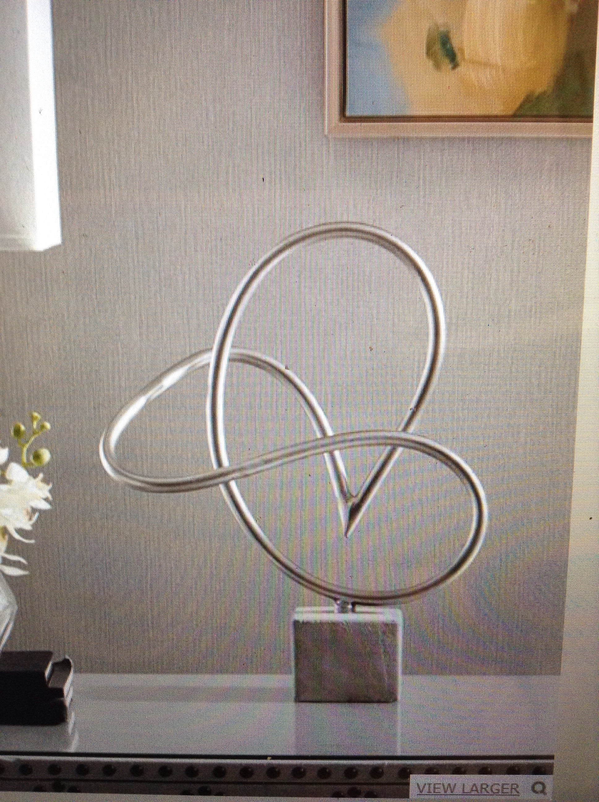Metal table decor with cement base