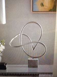 Metal table decor with cement base